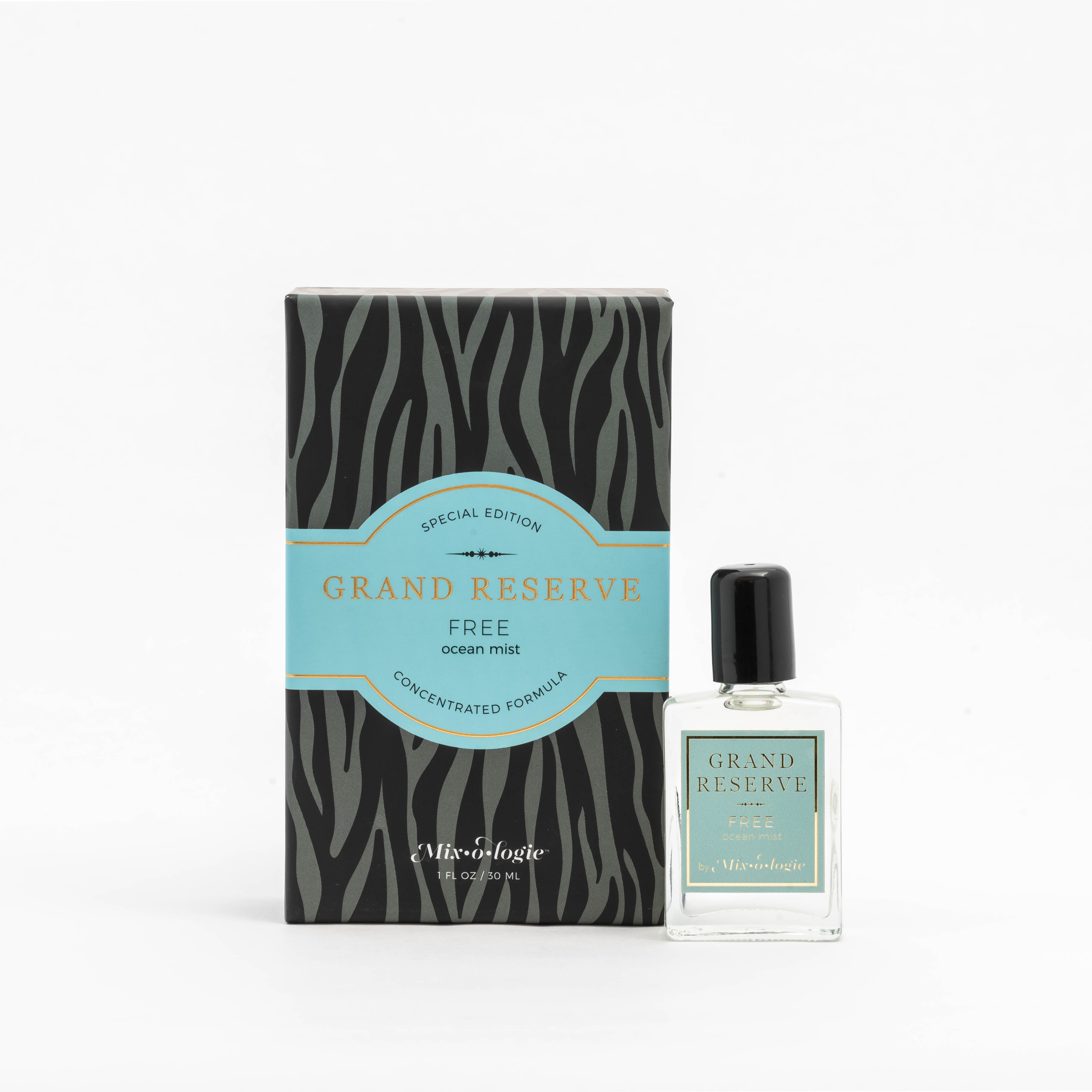 Free (Ocean Mist) Special Edition Grand Reserve concentrated formula in clear glass rectangle perfume bottle that has 1 fl oz or 30 mL of clear liquid with black cap, label, and spray nozzle. Black zebra pattern rectangle box with pale blue letting. Grand Reserve and box pictured with white background.