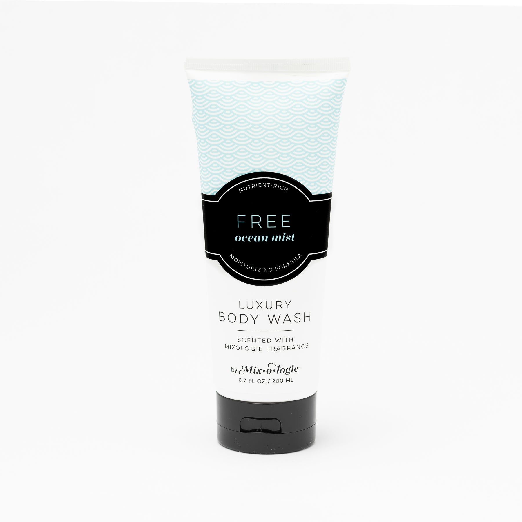 Luxury Body Wash in Mixologie’s Free (Ocean Mist) in light blue color sample package with black label. Contains 6.7 fl oz or 200 mL pictured on a white background