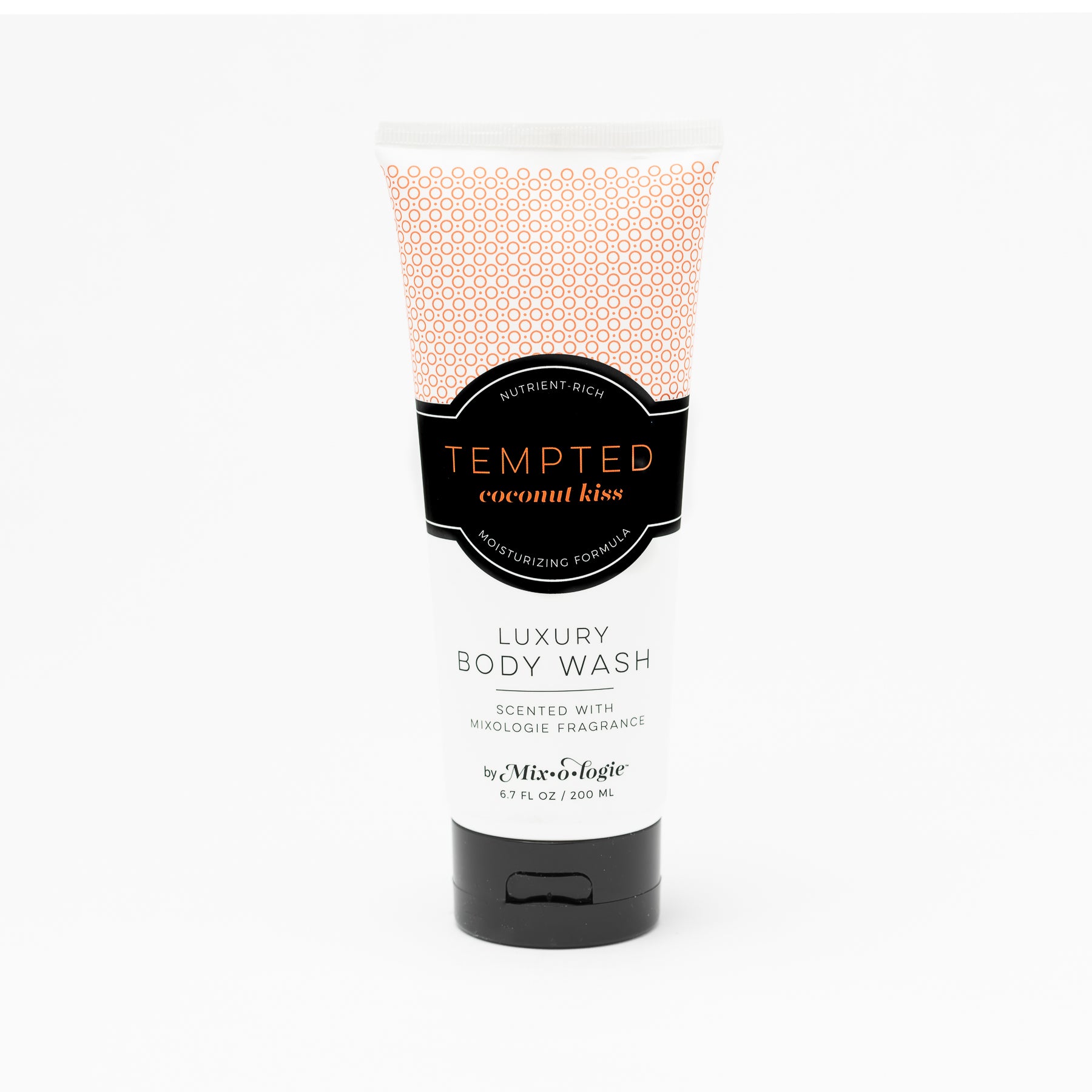 Luxury Body Wash in Mixologie’s Tempted (Coconut Kiss) in peach color sample package with black label. Contains 6.7 fl oz or 200 mL pictured on a white background. 