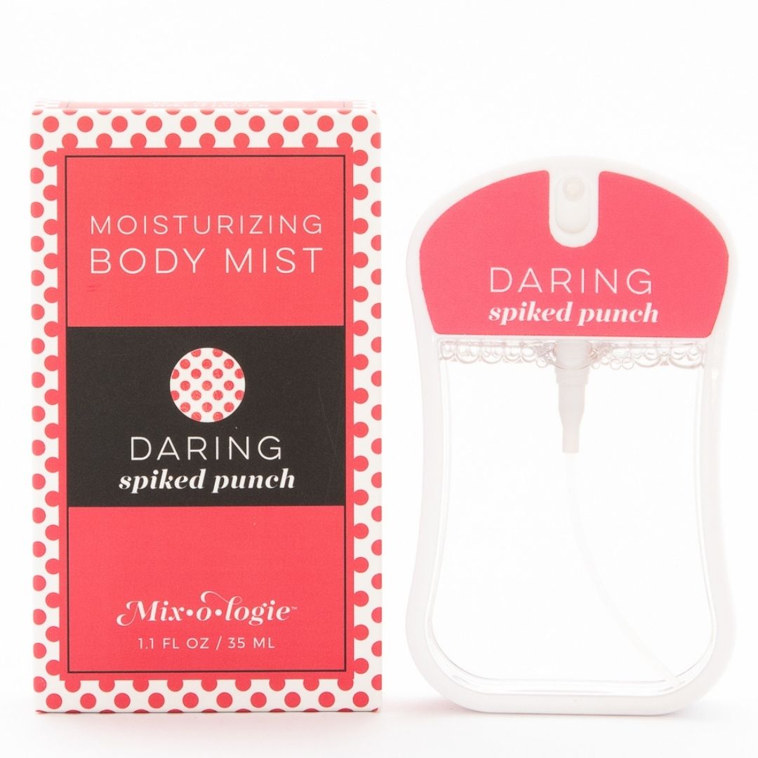 Daring (Spiked Punch) Moisturizing Body Mist in bright pink color box and rounded rectangle spray bottle with bright pink color label and clear liquid. Spray bottle has 1.1 fl oz or 35 ML. Spray bottle and box are pictured on white background