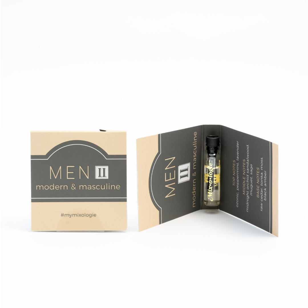 Men’s II (Modern & Masculine) Alcohol free perfume in an ivory color sample card. Wear alone or layer with other Mixologie scents to create a custom blend. Alcohol-free fragrance oils are .017 Fl oz or .5 mL. Pictured front and inside of sample card on a white background.