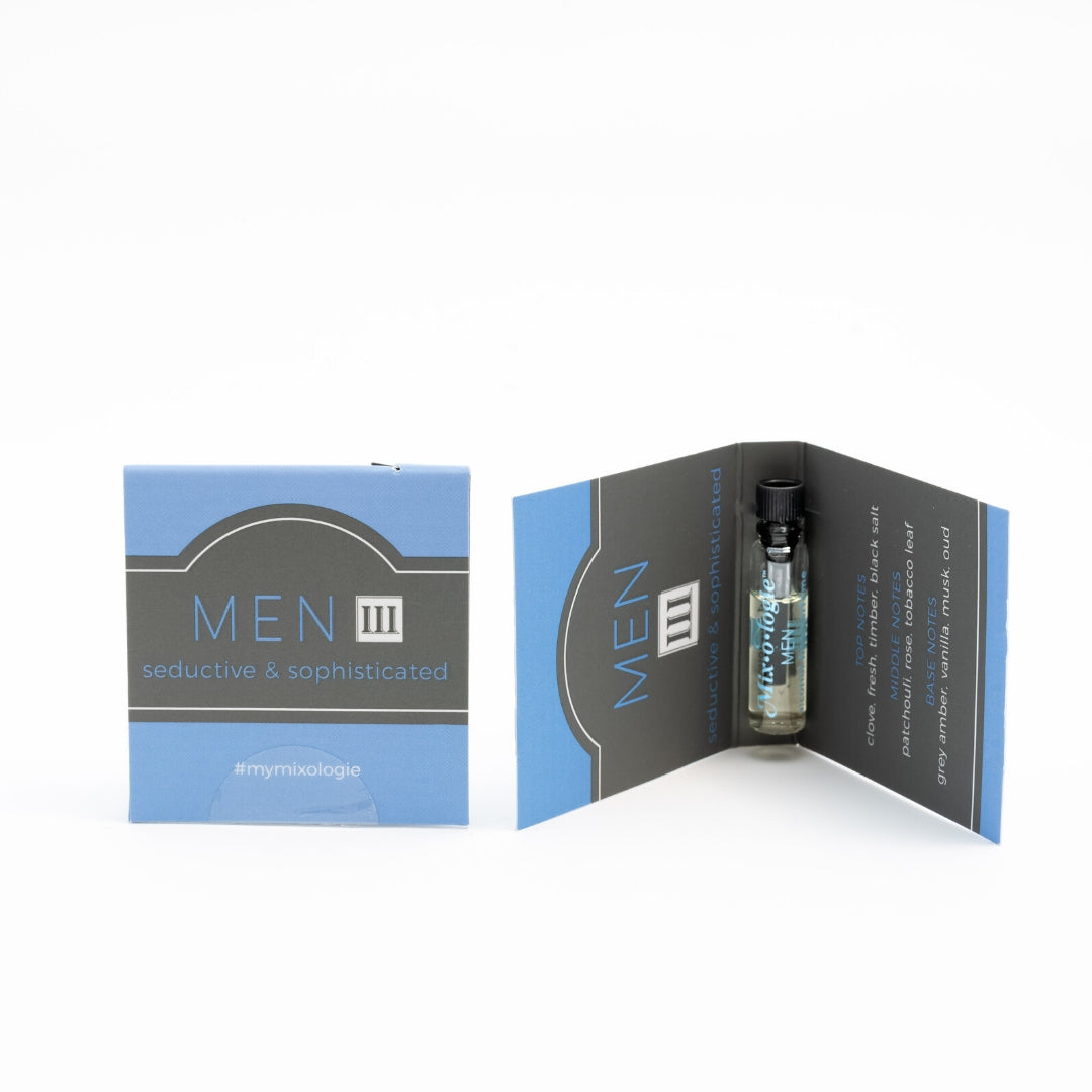 Men’s III (Seductive & Sophisticated)Alcohol free perfume in a pale blue color sample card. Wear alone or layer with other Mixologie scents to create a custom blend. Alcohol-free fragrance oils are .017 Fl oz or .5 mL. Pictured front and inside of sample card on a white background.